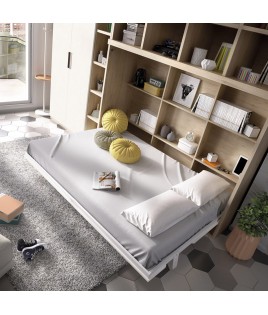 Dormitorio juvenil formado por cama abatible matrimonial con estantería superior y armario