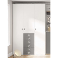 Dormitorio juvenil formado por cama abatible con estantería superior y armario